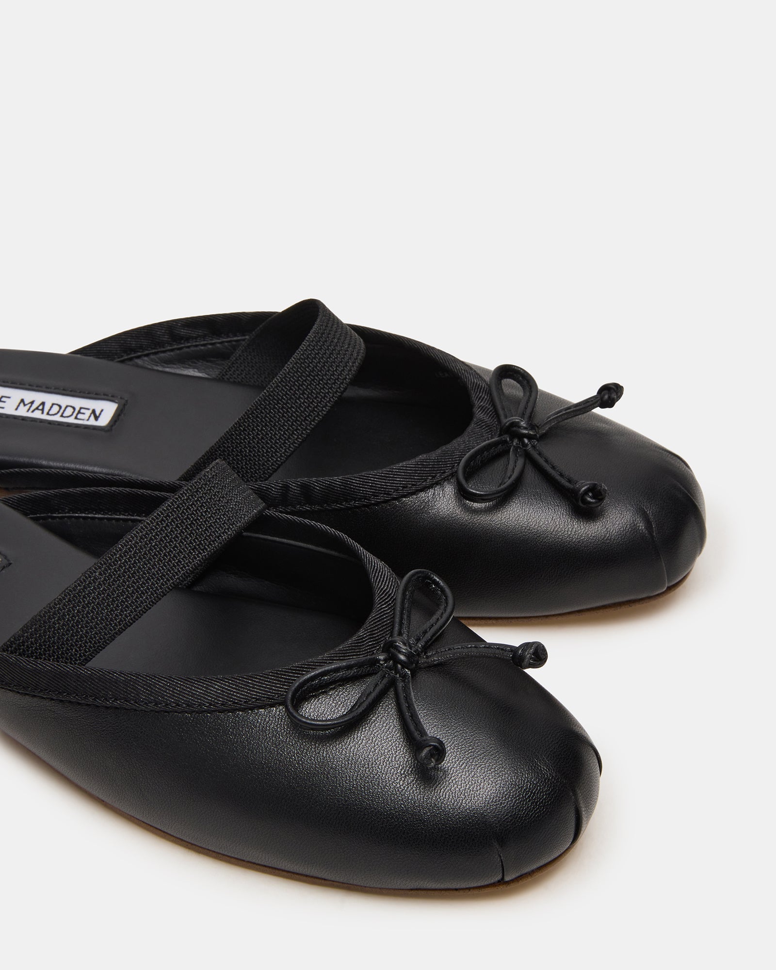 CUTESY BLACK LEATHER